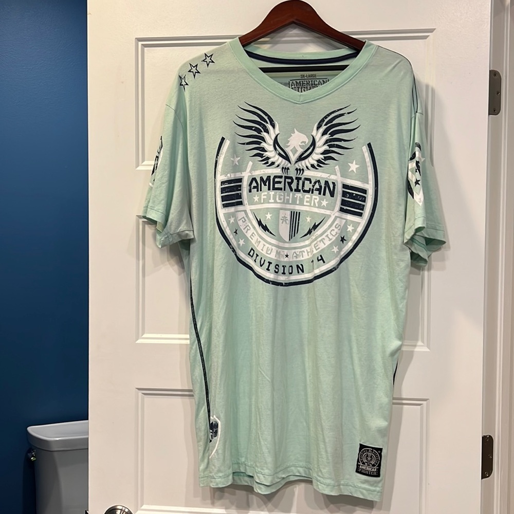 A nice teal American fighter shirt